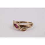 A ruby and diamond ring, comprising a twist-set marquise-cut ruby of approx 0.3 ct, bezel-set