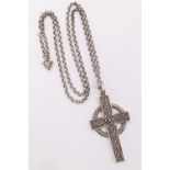 A 1980s silver Celtic cross necklace, the cross being decorated with Celtic influenced canetile