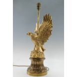A gilt metal table lamp in the form of an eagle, 53.5 cm