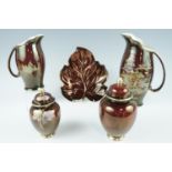 Two Carlton Ware Rouge Royale lidded jars, tallest 18 cm together with a leaf dish and two Crown