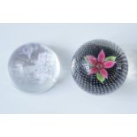 A Caithness "Flower in the Rain" paperweight together with an Edinburgh Crystal etched glass weight