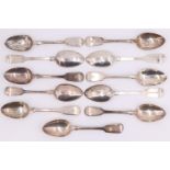 11 early Victorian silver Fiddle pattern table spoons, the terminals verso bearing an engraved Old
