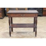 An early 19th Century mahogany side table, having a frieze drawer with brass bale handle,