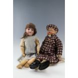 A late 19th / early 20th Century Armand Marseille bisque headed doll, having an open mouth and
