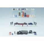 A group of diecast and other vehicles, telephone boxes, miniature figures, etc