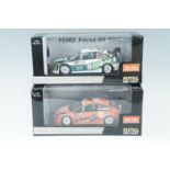 Two die-cast Modern Rally Collectables, Ford Focus WRC cars, 1:18 Scale