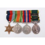A George VI - QEII Territorial Efficiency medal with three bars and Second World War campaign medals