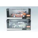 Two die-cast Modern Rally Collectables, Ford Focus WRC cars, 1:18 Scale
