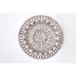 A 20th Century Indian white metal filigree dish, (tests as silver), 72 g, 10.5 x 2 cm