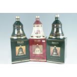 Three boxed Bells Christmas decanters of whisky
