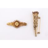 A Victorian 9 ct gold Etruscan revival tablet brooch set with a small diamond, together with an