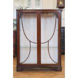 A 1930s Art Deco influenced astragal-glazed mahogany display cabinet, 90 cm x 31 cm x 128 cm