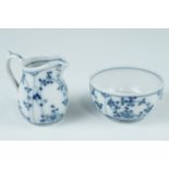 A 19th Century diminutive jug and sugar basin, having blue and white lace underglaze decoration, the
