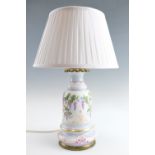 A Victorian glass oil lamp base table lamp, having gilt and hand painted polychrome floral