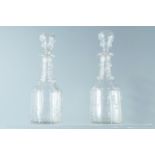 A pair of Victorian cut glass decanters, 27 cm, (free of chips or cracks)