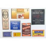 Eight vintage merchandising labels affixed to card including "Taylor's Old Ruby Port" and "Sailor
