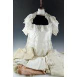 A quantity of antique and vintage clothing and costume including a late 19th / early 20th Century