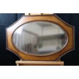 A 1930s oak-framed bevel-edged wall mirror with rope moulding, 80 cm x 56 cm