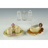 A Royal Winton Grimwades floral moulded earthenware condiment set, a diminutive Burleighware sauce