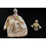 Two late 19th Century pin cushion ladies