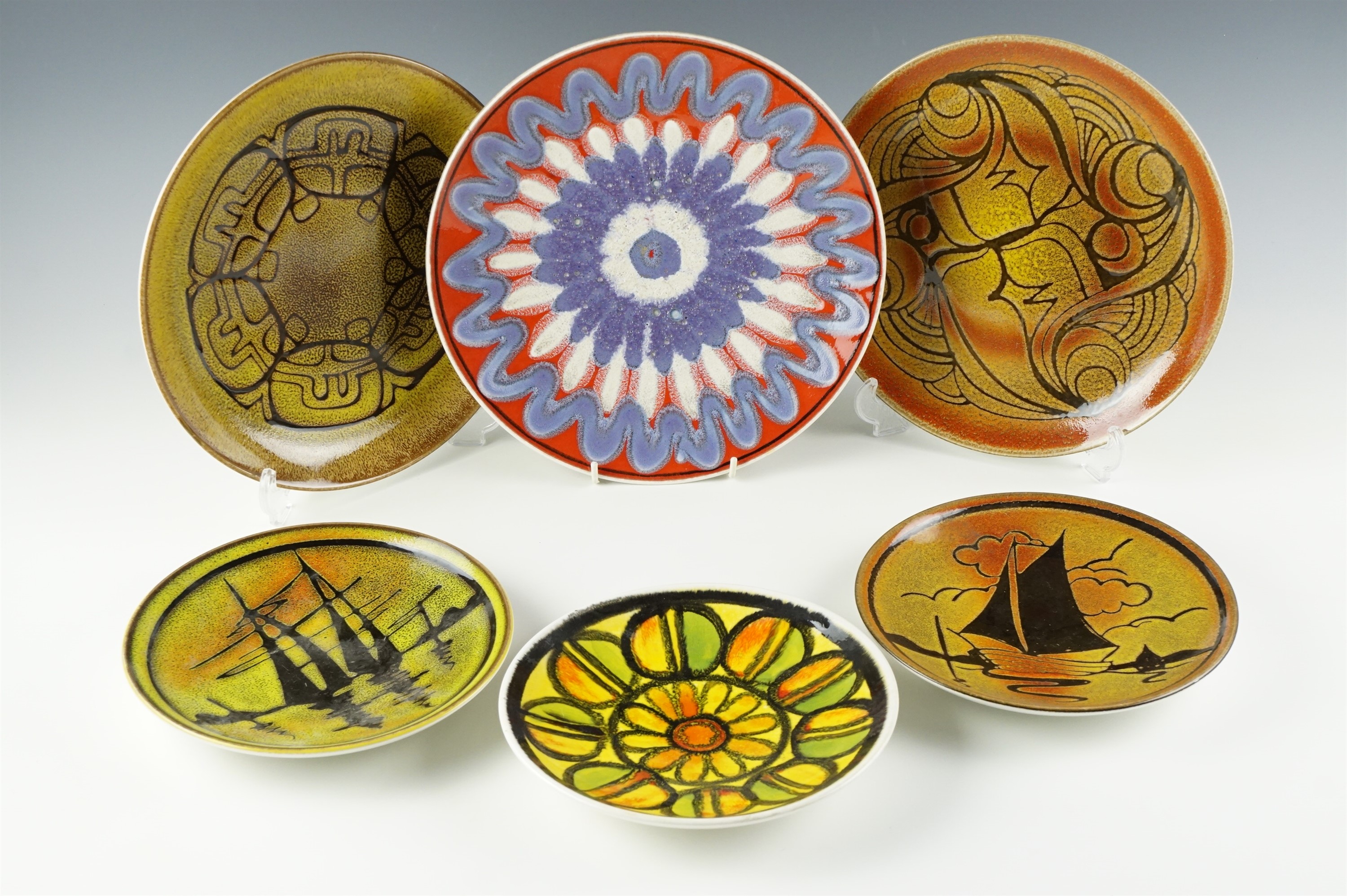 Six 1960s Poole Delphis / Aegean circular plates / dishes, largest 27 cm