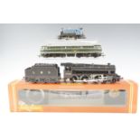 A Hornby model railway LMS Class 5 locomotive in black livery, together with a diesel locomotive and