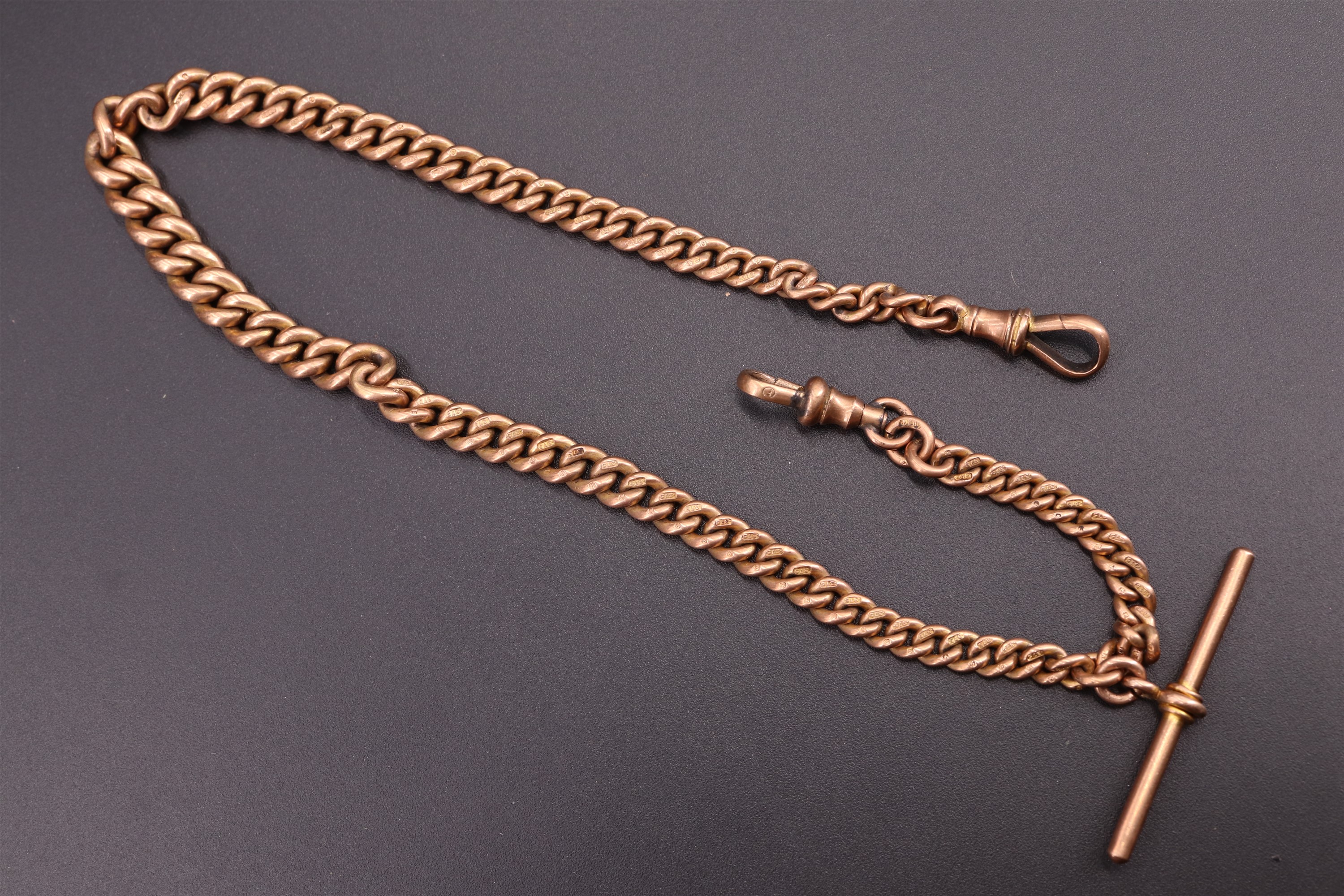 An early 20th Century 9 ct gold adorsed graduated curb link watch chain, Birmingham, 38.61 g, 35 cm