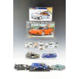A Hornby "Ford Focus WRC" model kit together with a Revell "Ferrari 360 Modena" kit, seven Burago