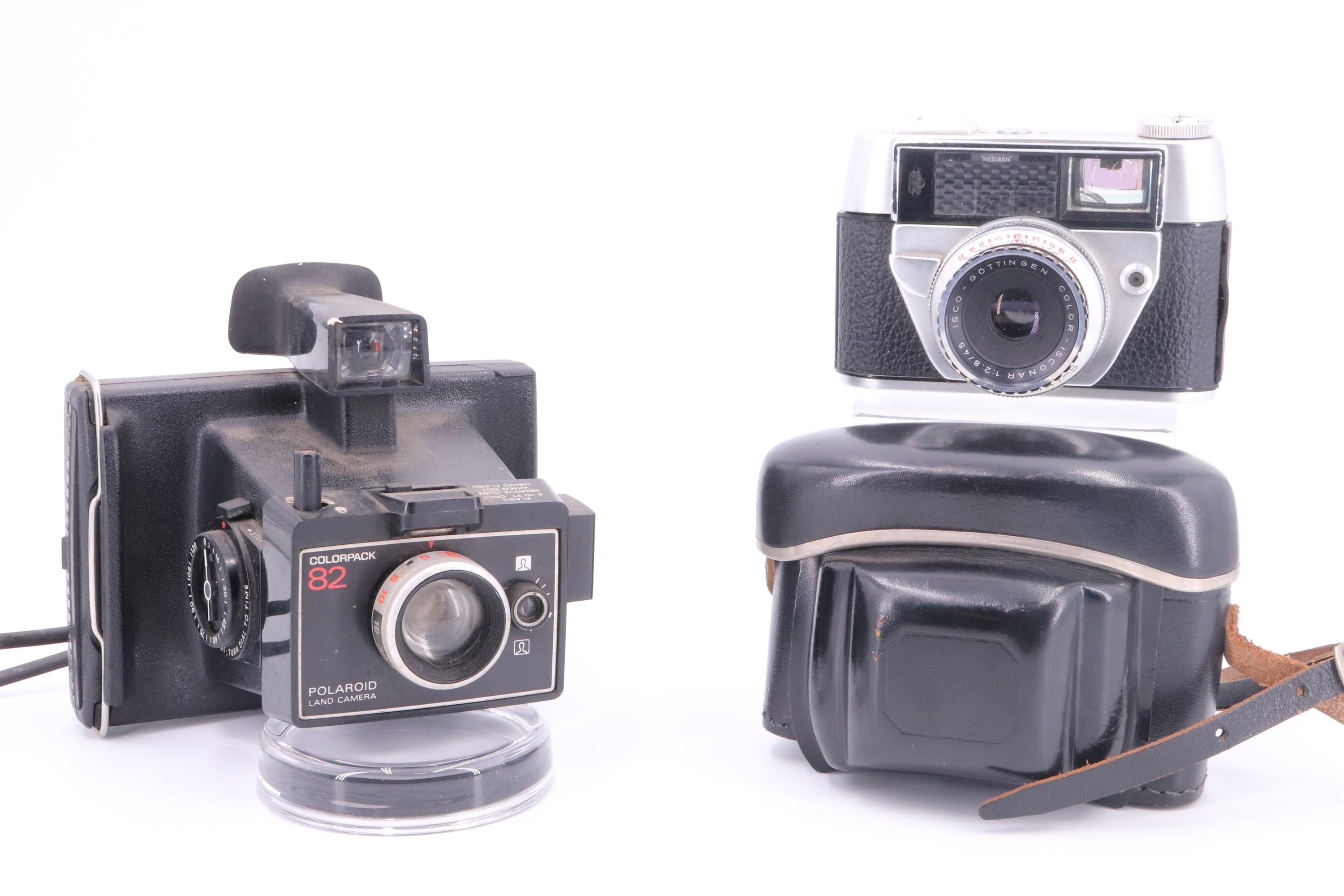 An Olympia "Regula Auto - Set II" camera together with a Polaroid "Colorpack 82" land camera