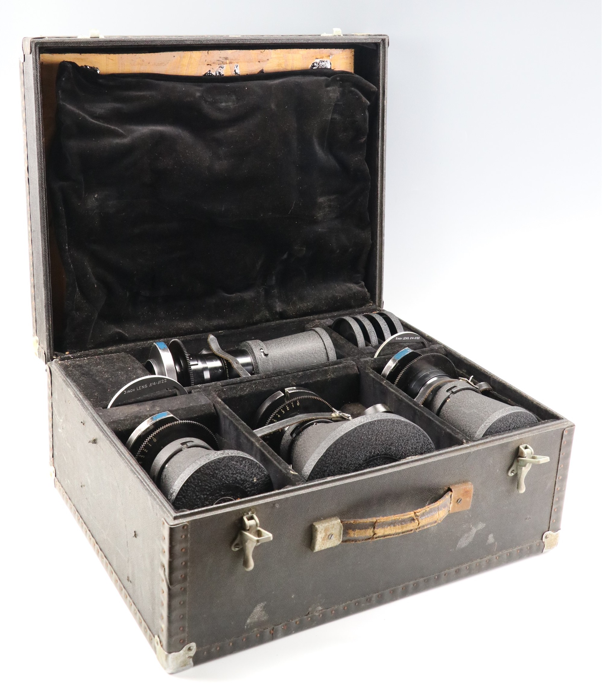 A cased set of Taylor and Hobson camera lenses, comprising an Ortal 2 inch 50 mm f/2 T2.3 TV Lens,