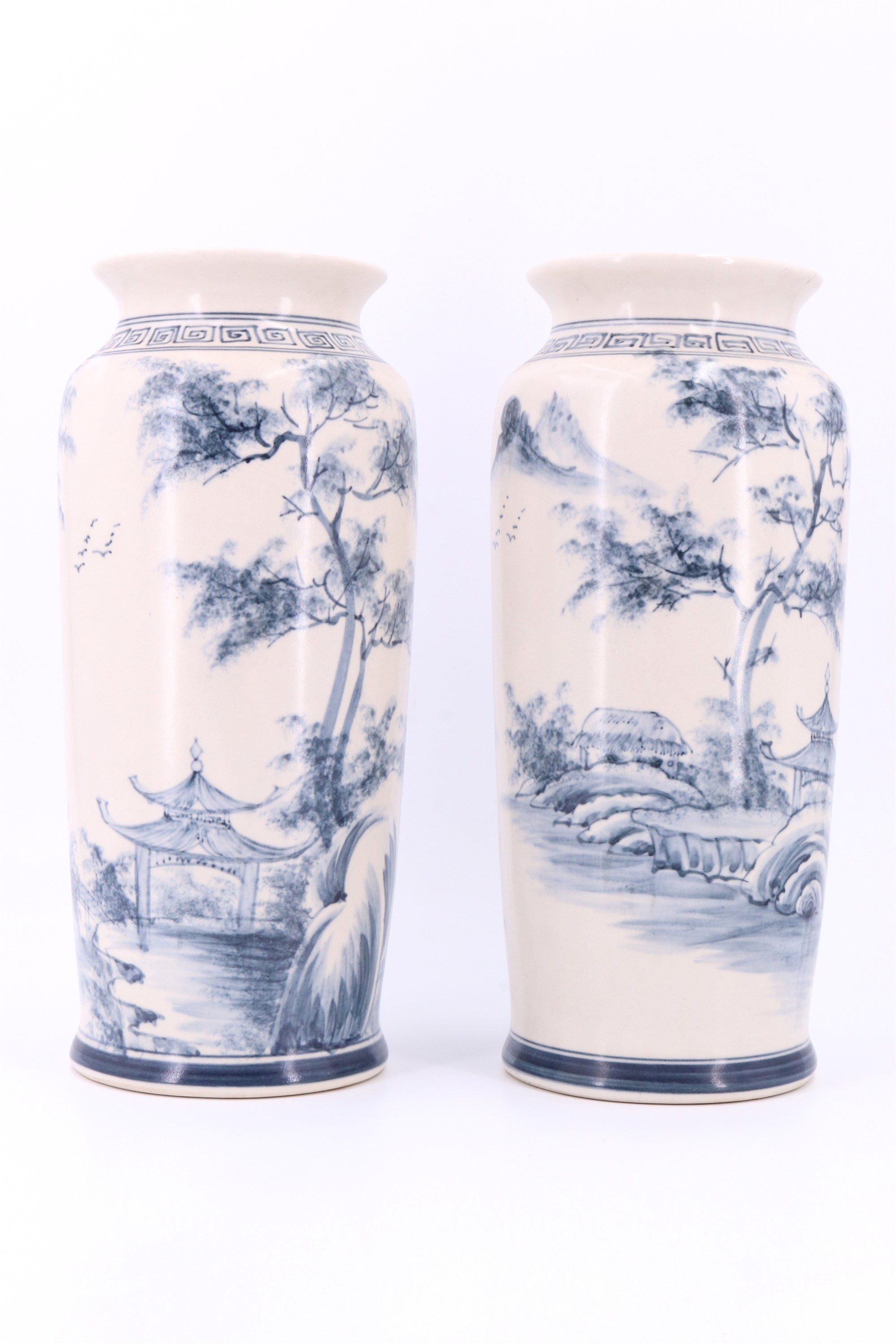 A pair of late 20th Century Chinese blue-and-white shouldered cylindrical vases, 32 cm