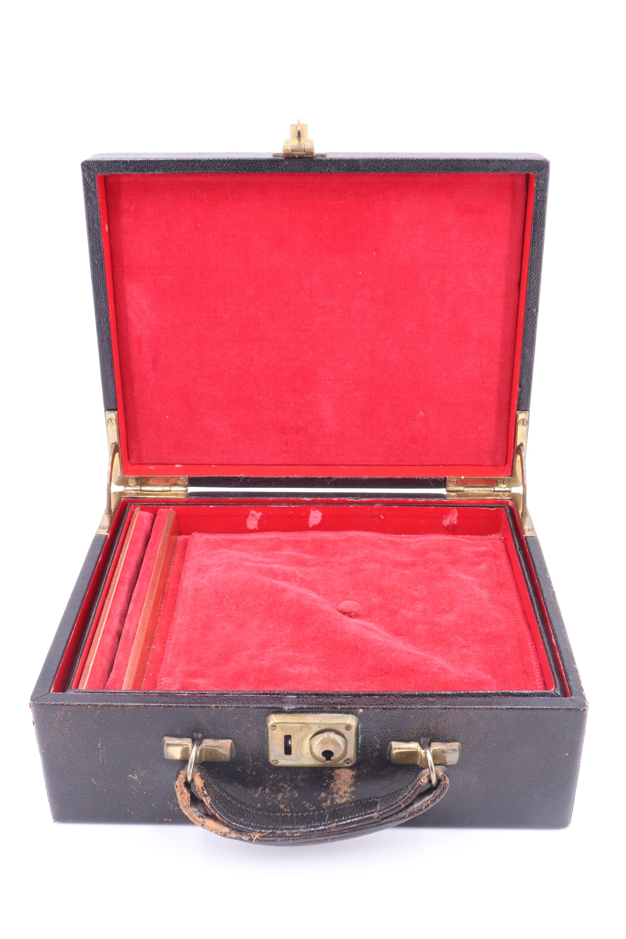 A vintage leather covered jewellery case, having a lift out tray with a ring holder, the cover