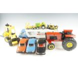 A group of Tonka diecast vehicles, including a tractor, forklift, etc, together with three