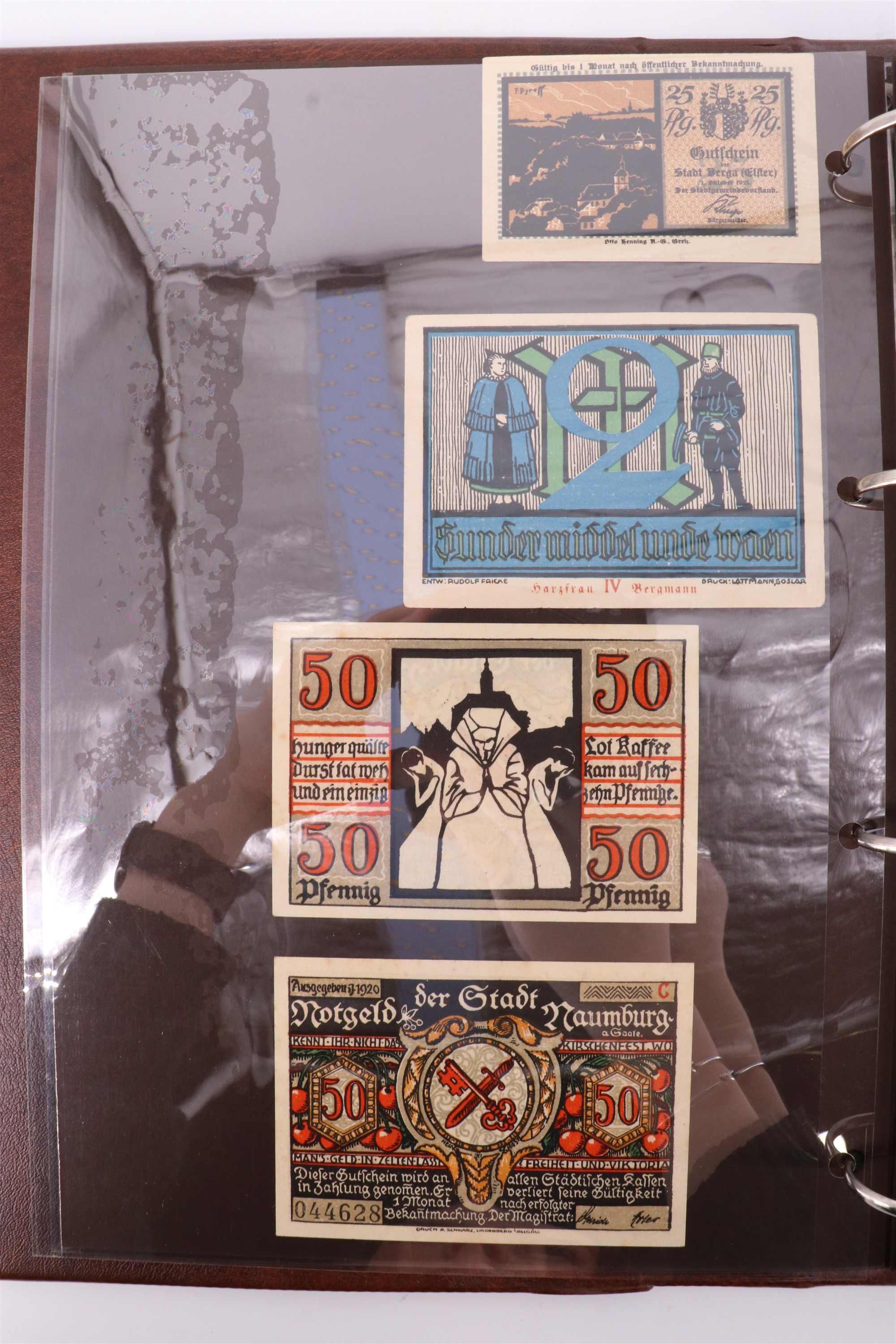 Two albums containing a collection of world banknotes, including German Notgeld, USA, Russia, New - Image 7 of 55