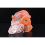 A Chinese carved rock crystal monkey and peaches, 3.5 cm x 4 cm
