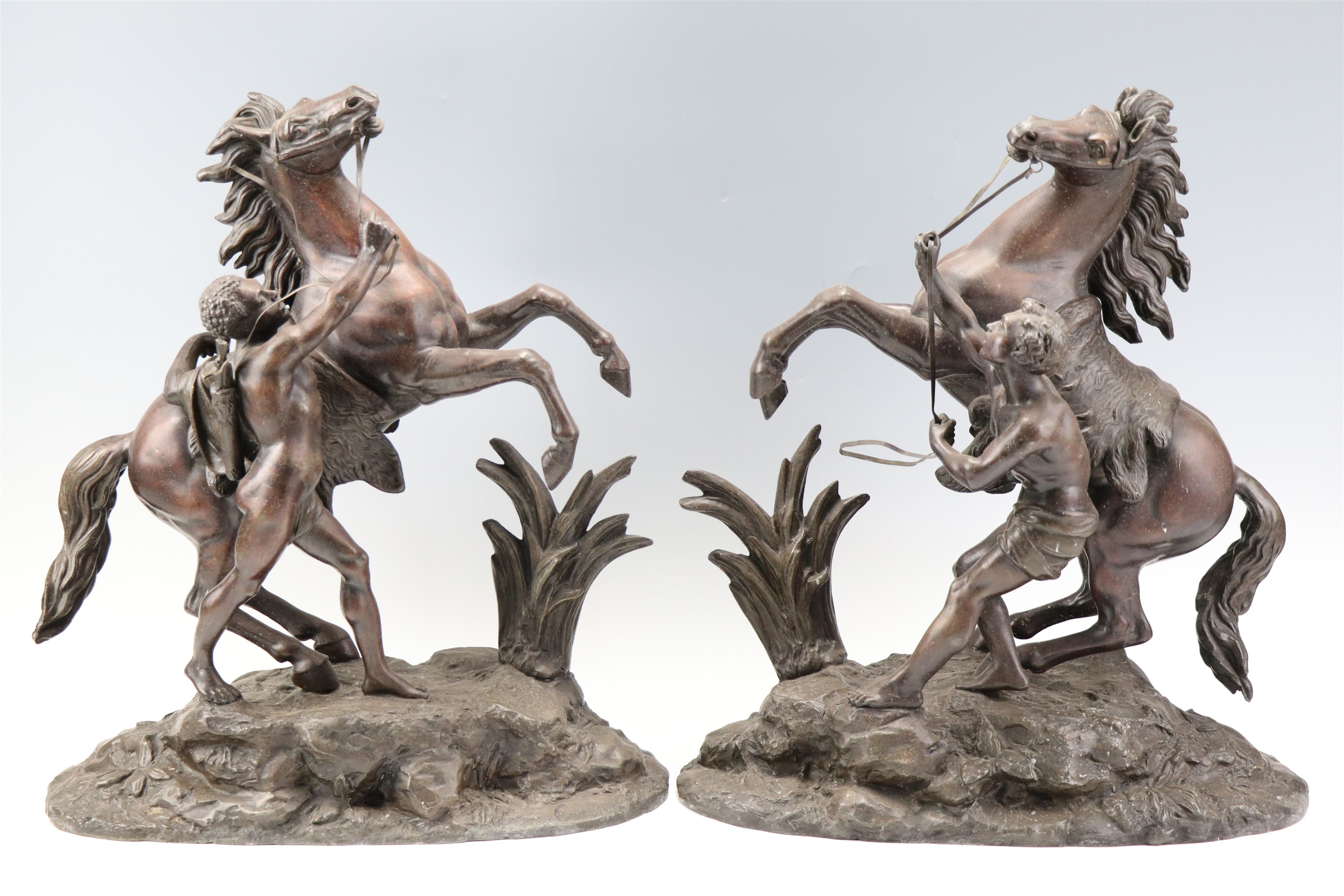 After Guillaume Coustou (1677 - 1746) "Marly Horses", a pair of late 19th / early 20 Century spelter