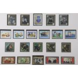 A framed display of Churchill commemorative stamps, double card mounted in moulded frame under