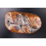 A Chinese carved jade or similar hardstone tiger and cub, 5 cm