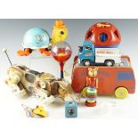 Vintage children's toys, including a 1960s Fisher Price pull along toy "Snoopy", a similar turtle