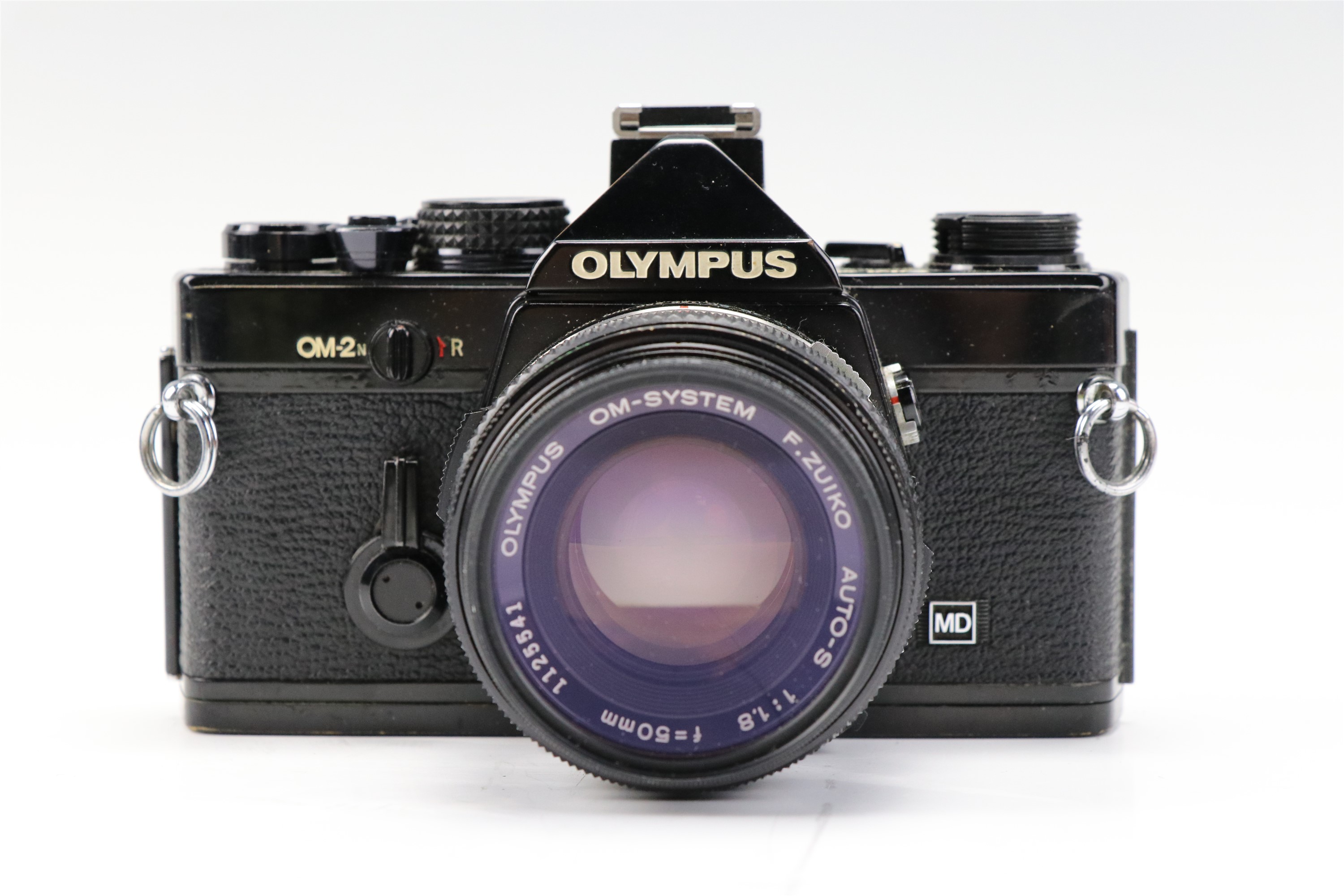 An Olympus OM-2 camera body together with a 1:1,8 f = 50mm lens, a Teleconverter 2X-A lens, a - Image 18 of 19