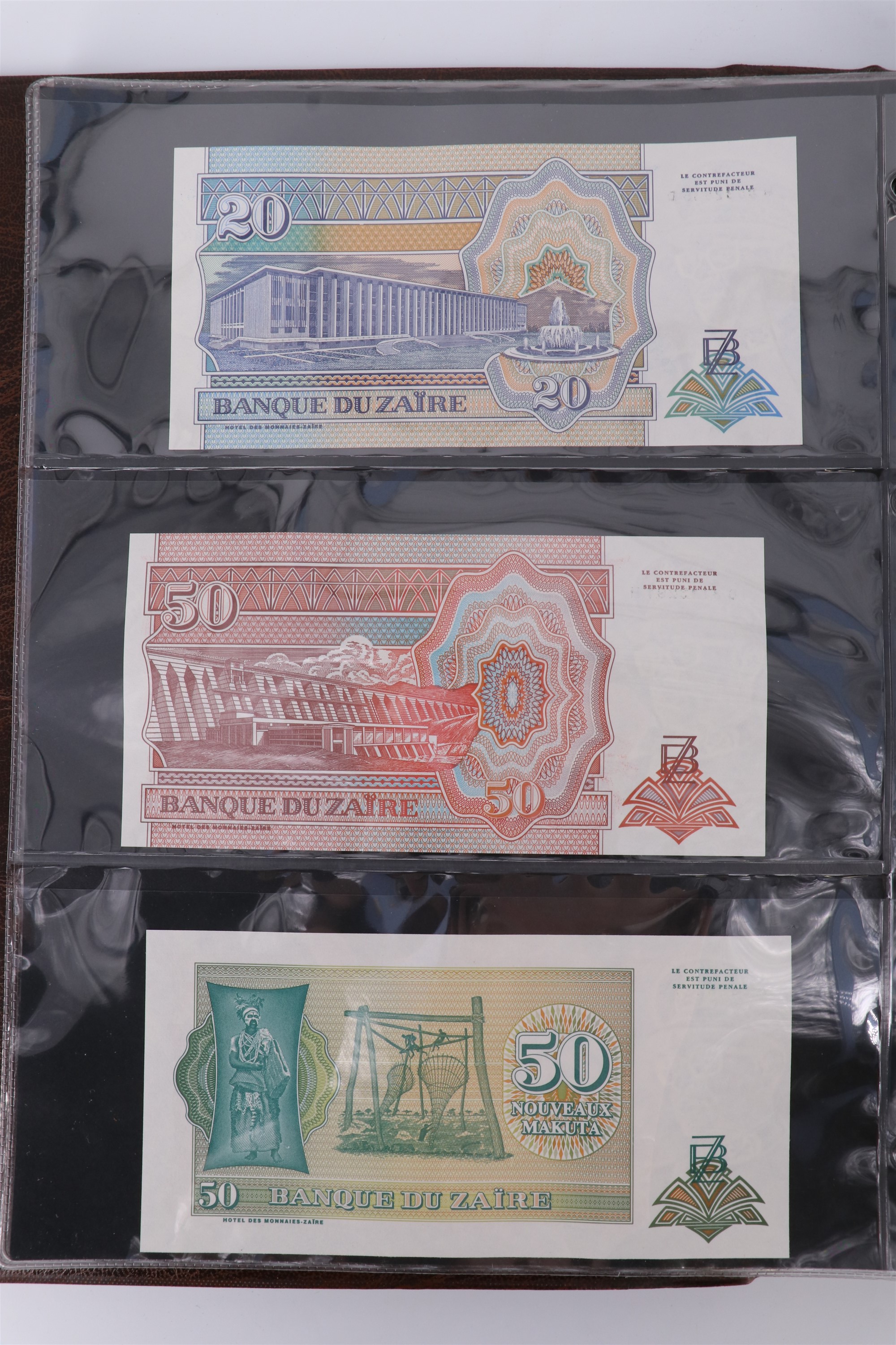 An album containing a collection of world banknotes, including Zaire (DR Congo), Ireland, - Image 7 of 87