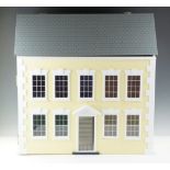 A doll's house together with a collection of dolls, furniture and other accessories, house 67 x 39 x