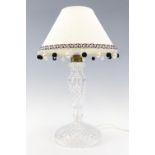 A cut glass table lamp, 34 cm to top of socket