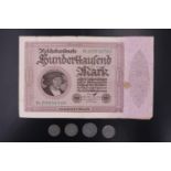 A Weimar German hyper-inflation banknote together with four German Third Reich coins