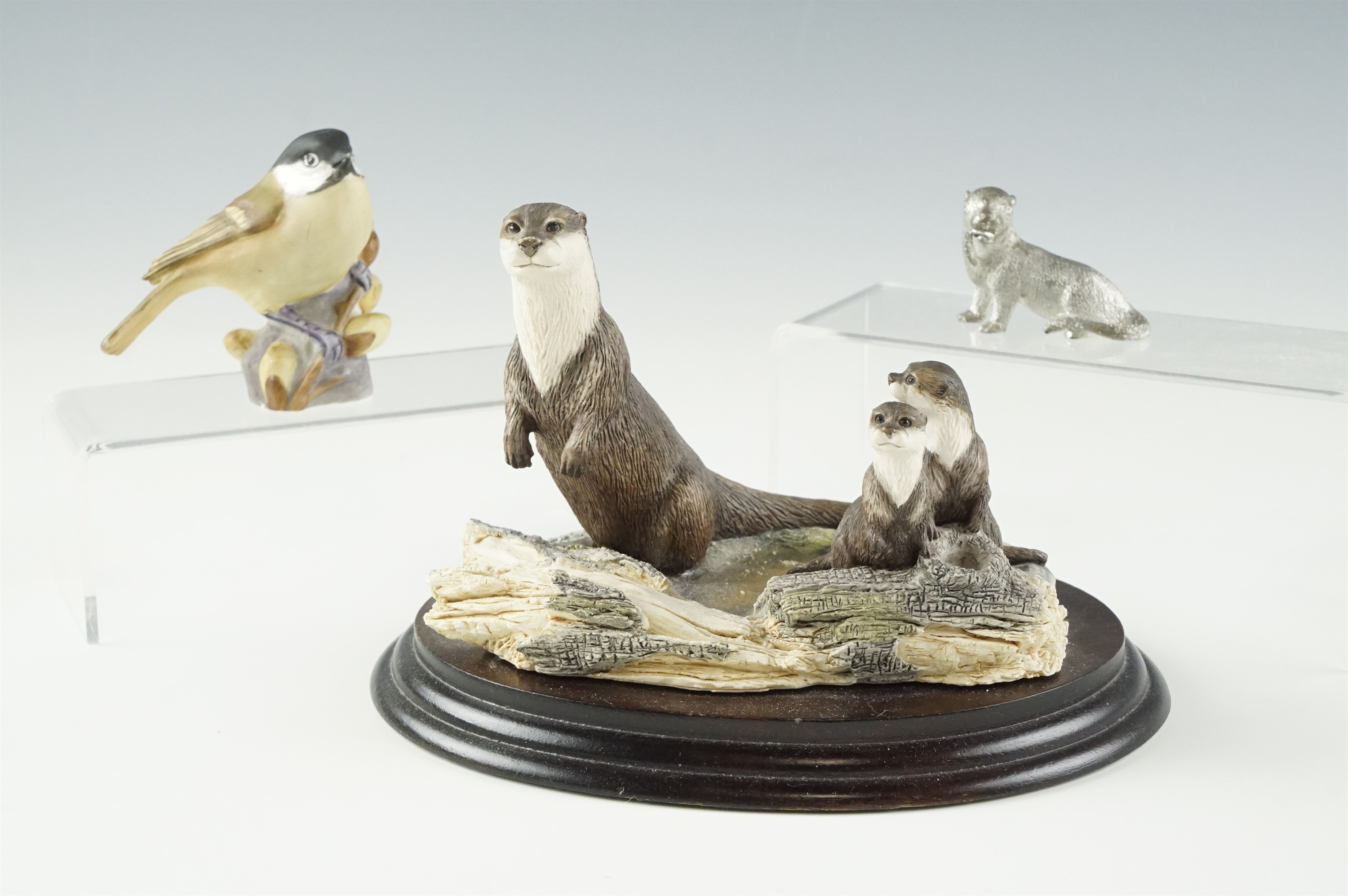 A Border Fine Arts Wildlife Families figurine "RW2 Otter" together with a Royal Worcester