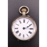 A late 19th Century Swiss white metal fob watch, having a crown wind pin set movement, in an