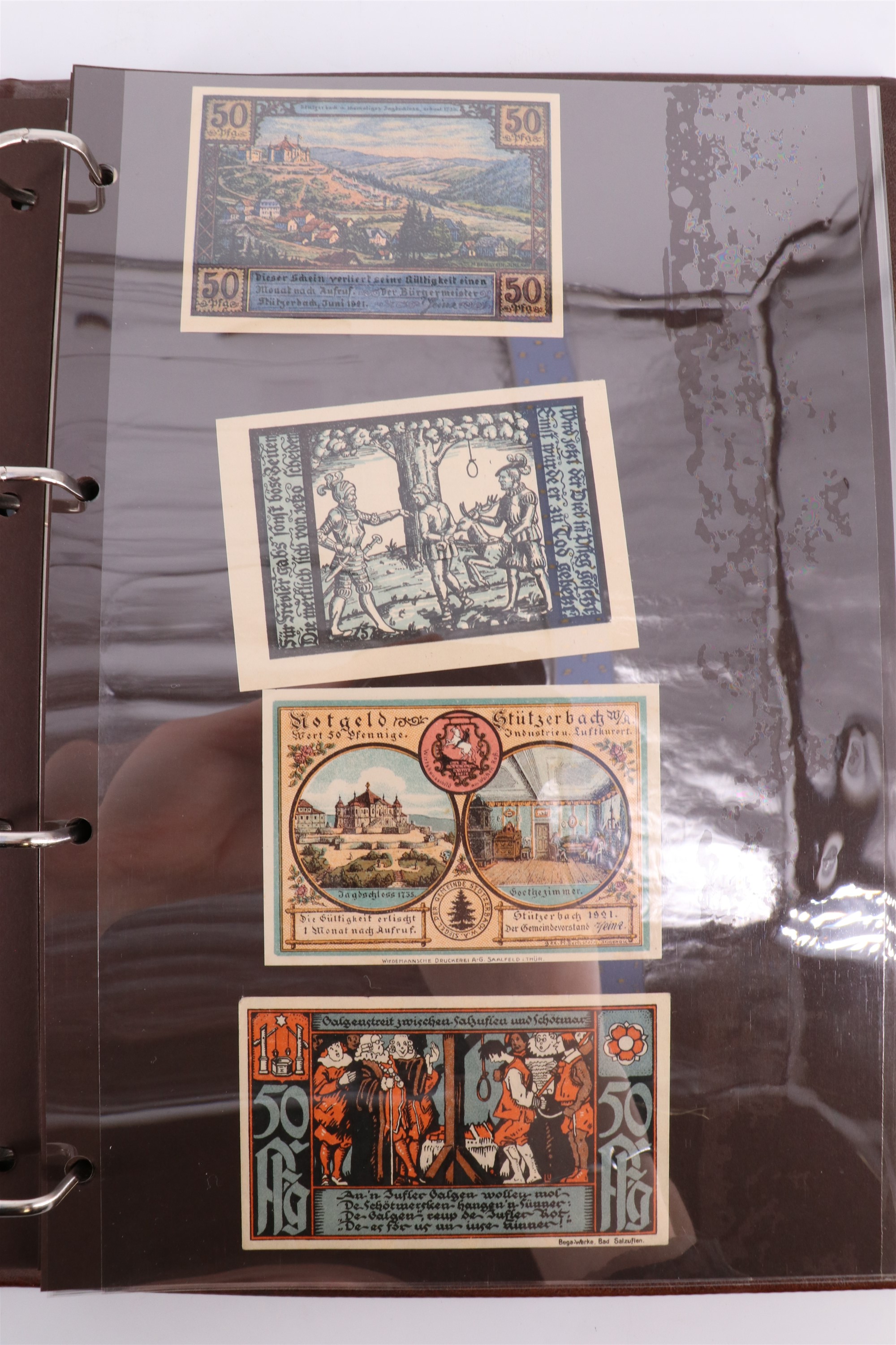 Two albums containing a collection of world banknotes, including German Notgeld, USA, Russia, New - Image 4 of 55
