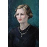 Garnet Ruskin Wolseley (1884 - 1967) A portrait of a young lady wearing knotted pearls in