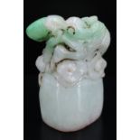 A Chinese carved jade seal, its top in the form of a dragon, 39 mm