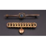 Two early 20th Century yellow metal bar brooches, comprising a brilliant aquamarine millegrain set